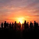 silhouettes_of_many_people_running_at_sunset_1789677365